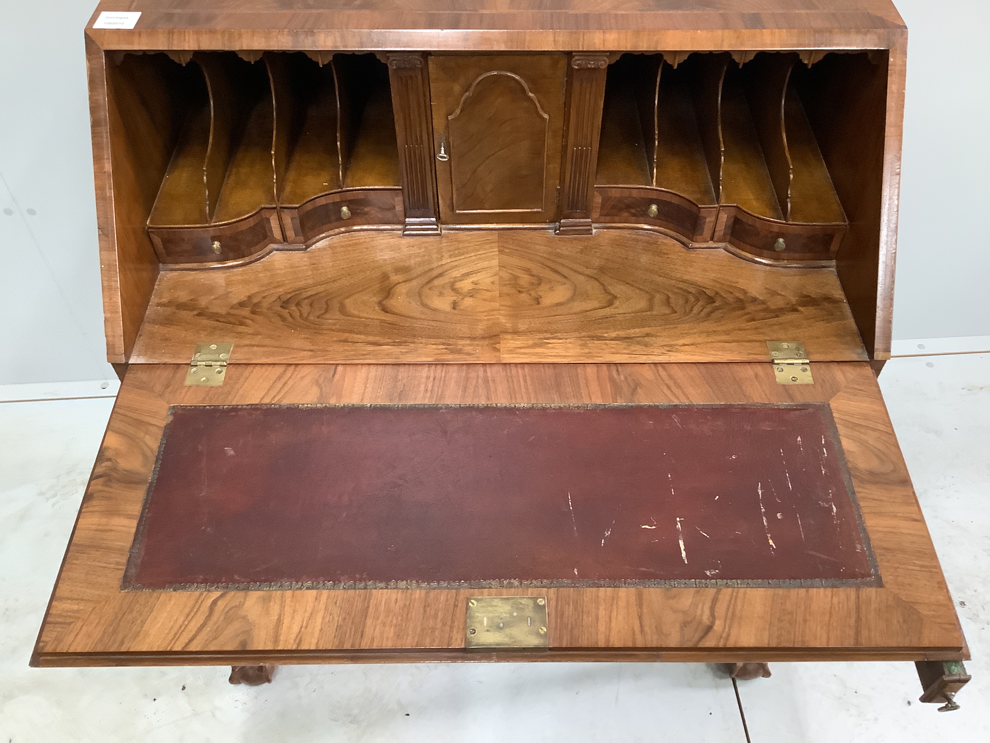 A Queen Anne revival feather banded walnut bureau, width 82cm, depth 49cm, height 105cm